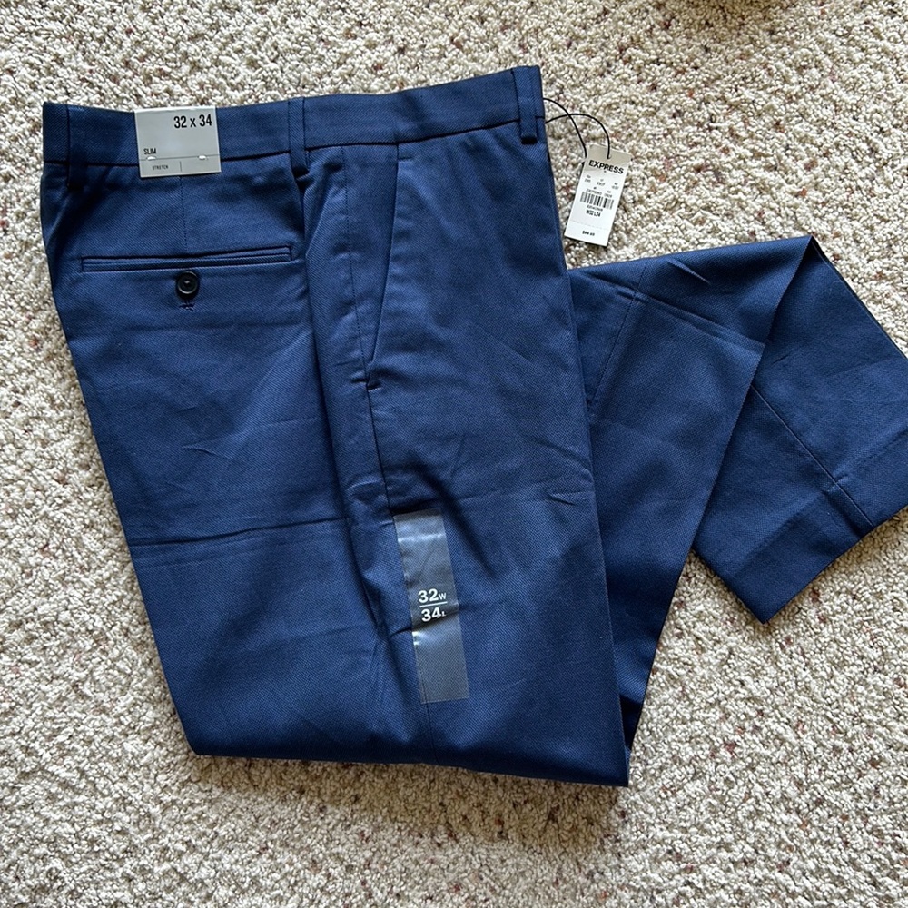 New with tags men’s navy dress pants from Express.